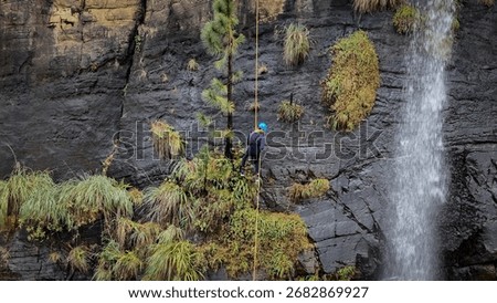 Boy Abseiling Down Bambarakanda Waterfall Sri Lanka Adventure Travel