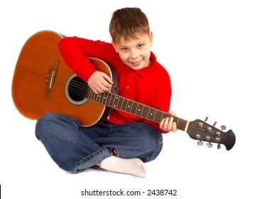 The boy with an acoustic guitar on a white background