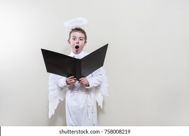 Boy Angel Singing In The Choir