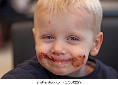 Boy Ate Chocolate And Smudged His Face