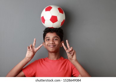 Boy Balancing Soccer Ball On His Stock Photo (Edit Now) 1528649066