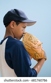 Boy In Baseball Clothing