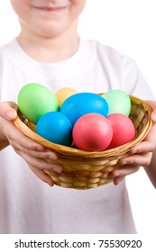 Boy with  a basket with Easter eggs on a white background
