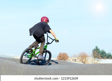 Boy In Bike Helmet On Bmx Track