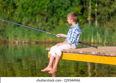 Boy Blue Shirt Sit On Pier Stock Photo 229344946 | Shutterstock