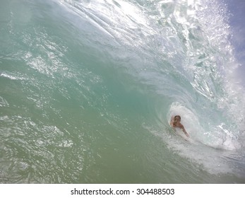 Boy Bodysurfing Tube 03