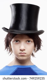 Boy With Brown Wig And Black Hat - Isolated On White