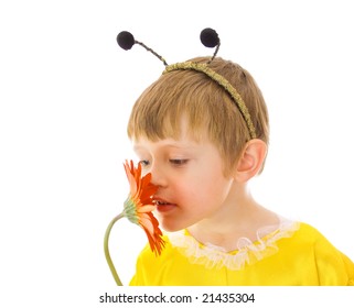 Boy In Bumble Bee Costume Smelling Red Flower