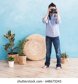 A boy with a camera. Portrait
