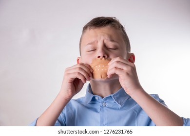 Boy Can't Talk With A Band-Aid Over His Mouth In Blue Shirt