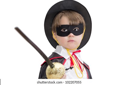 Boy with carnival costume . Little fighting zorro.