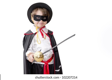 Boy with carnival costume . Little fighting zorro.