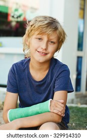 Boy With Cast On The Right Hand