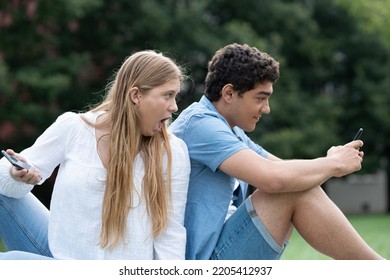 Boy Cheating Girlfriend On Social Media And Surprised Girl Watching Phone.