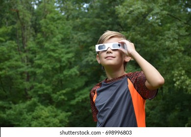 Boy Child Wearing Solar Eclipse Glasses Watching Outside