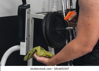 Boy Cleaning Gym Machines After Using It