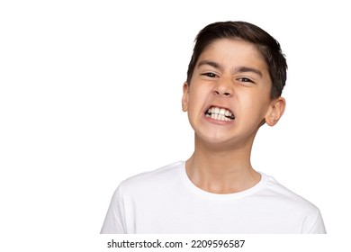Boy clenching his teeth on white background - Shutterstock ID 2209596587