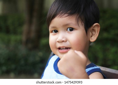 Boy committed and encouraging them to continue their lives. toddler looking at camera