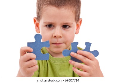 Boy connect puzzles isolated on white