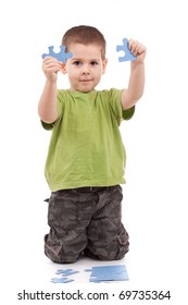 Boy connect puzzles isolated on white