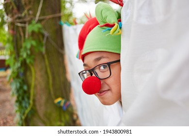 Boy As A Court Jester With A Red Nose At The Theater Performance In The Holiday Camp Talent Show