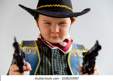 Boy In A Cowboy Costume