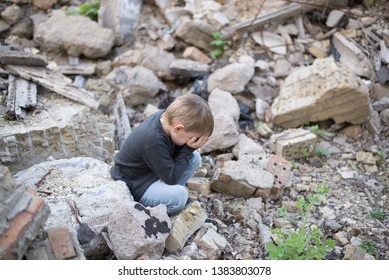 Boy Crying Among The Ruins