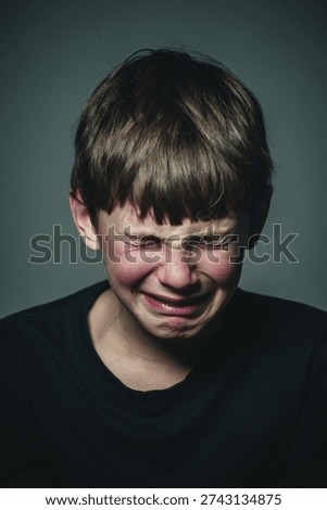 boy crying portrait close up