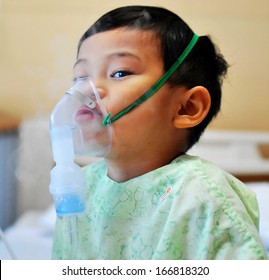 Boy Crying And Wear Oxygen Mask