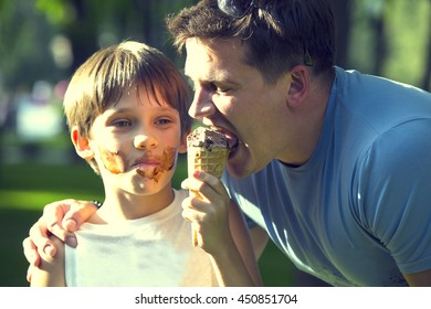 Boy And Dad Eating Ice Cream