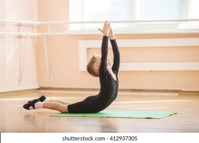 Boy Dancer Doing Exercise At Ballet Dance Class 