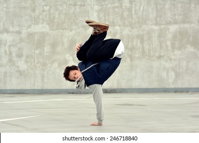 Boy Dancing Breakdance On The Street