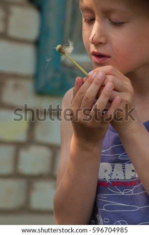 Similar – Image, Stock Photo Girl plucks off a piece of cotton candy