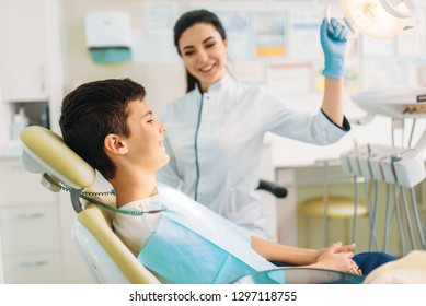 Boy in a dental clinic, pediatric dentistry - Shutterstock ID 1297118755