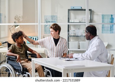 Boy With Disability Visiting Doctor With His Mom