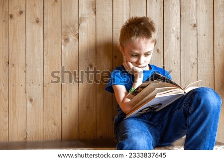 boy doesn't want read. Learning difficulties. Laziness. Boredom. copy space.