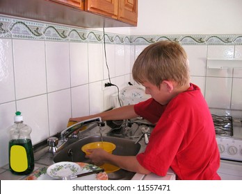 Boy Doing The Dishes