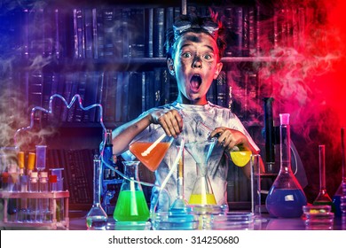A boy doing experiments in the laboratory. Explosion in the laboratory. Science and education. - Powered by Shutterstock