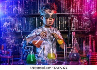 A boy doing experiments in the laboratory. Explosion in the laboratory. Science and education. - Powered by Shutterstock