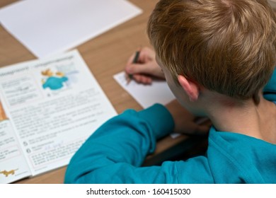 Boy Doing His Homework.