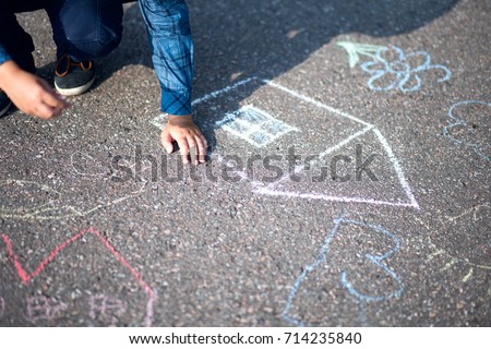 Boy drawing with chalk home orphan child dream 