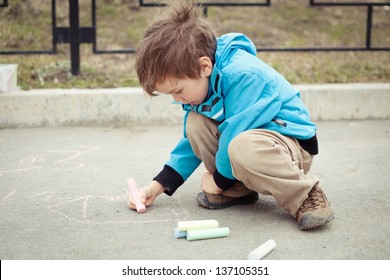 Boy drawing road  Outdoor 