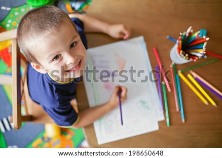 Boy, drawing a picture for fathers day