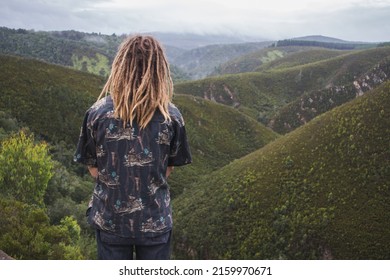 Boy With Dreadlocks Looking At The View Of The Knysna Forest