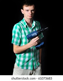 Boy with drill in hand