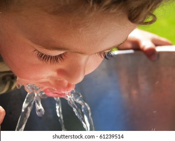 Boy At Drinking Fountain.