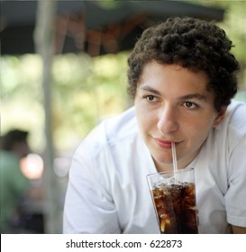 Boy Drinking Soda Outdoors