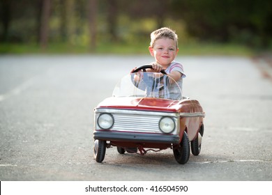Boy driving car