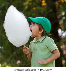 Boy Eat Candyfloss At The Park