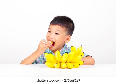 A Boy Eating Banana Fruit